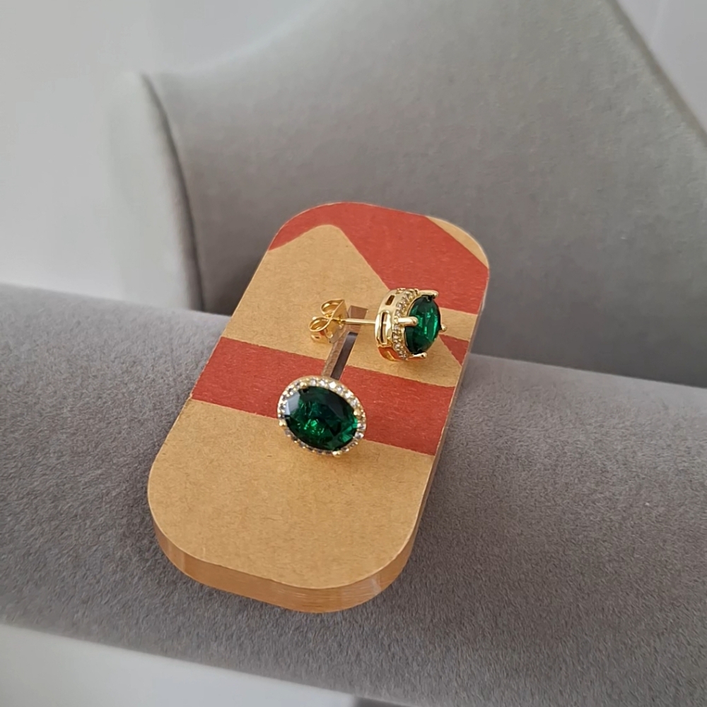 Oval shape emerald stud earrings